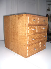 Brown oak collectors cabinet